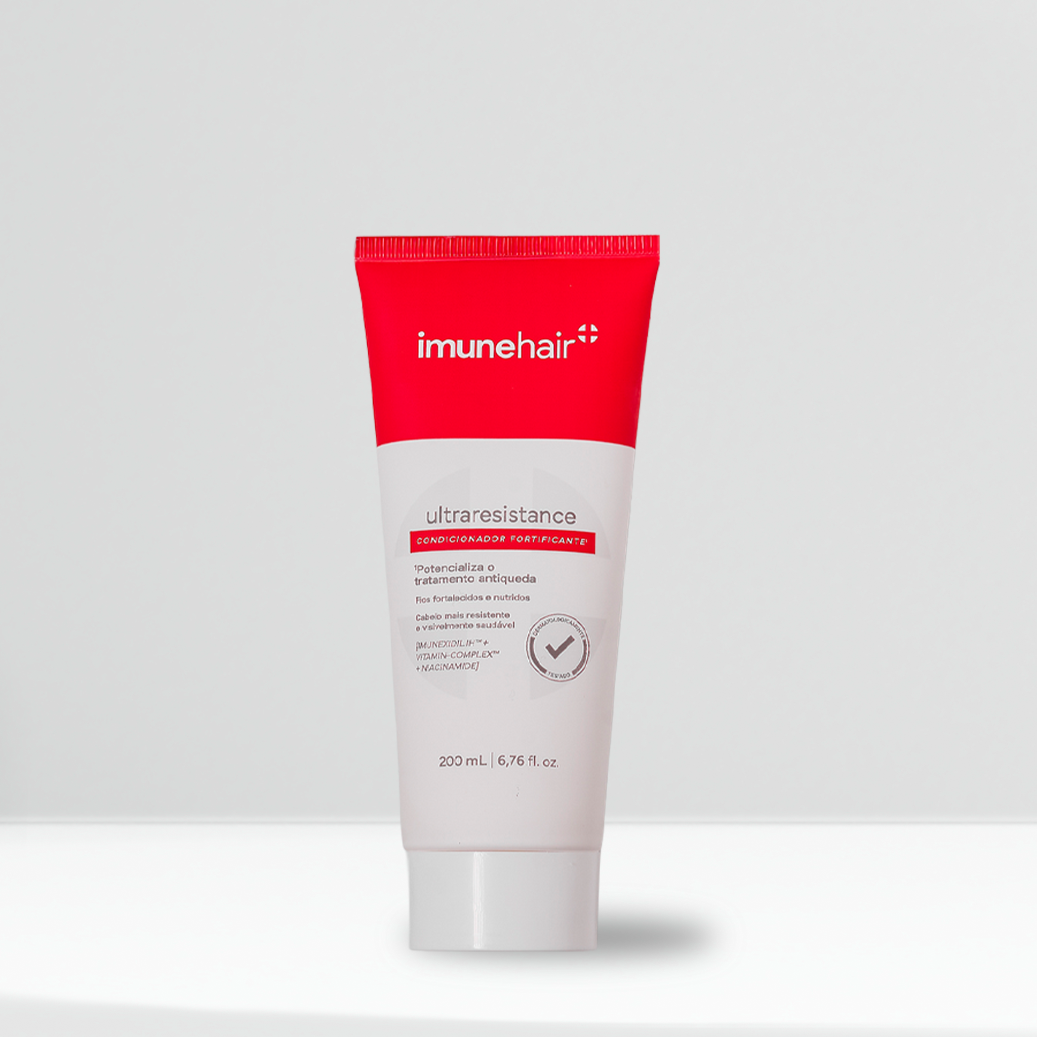 Embalagem vermelha e branca do condicionador fortificante, com o nome Condicionador Fortificante UltraResistance de 200ml.