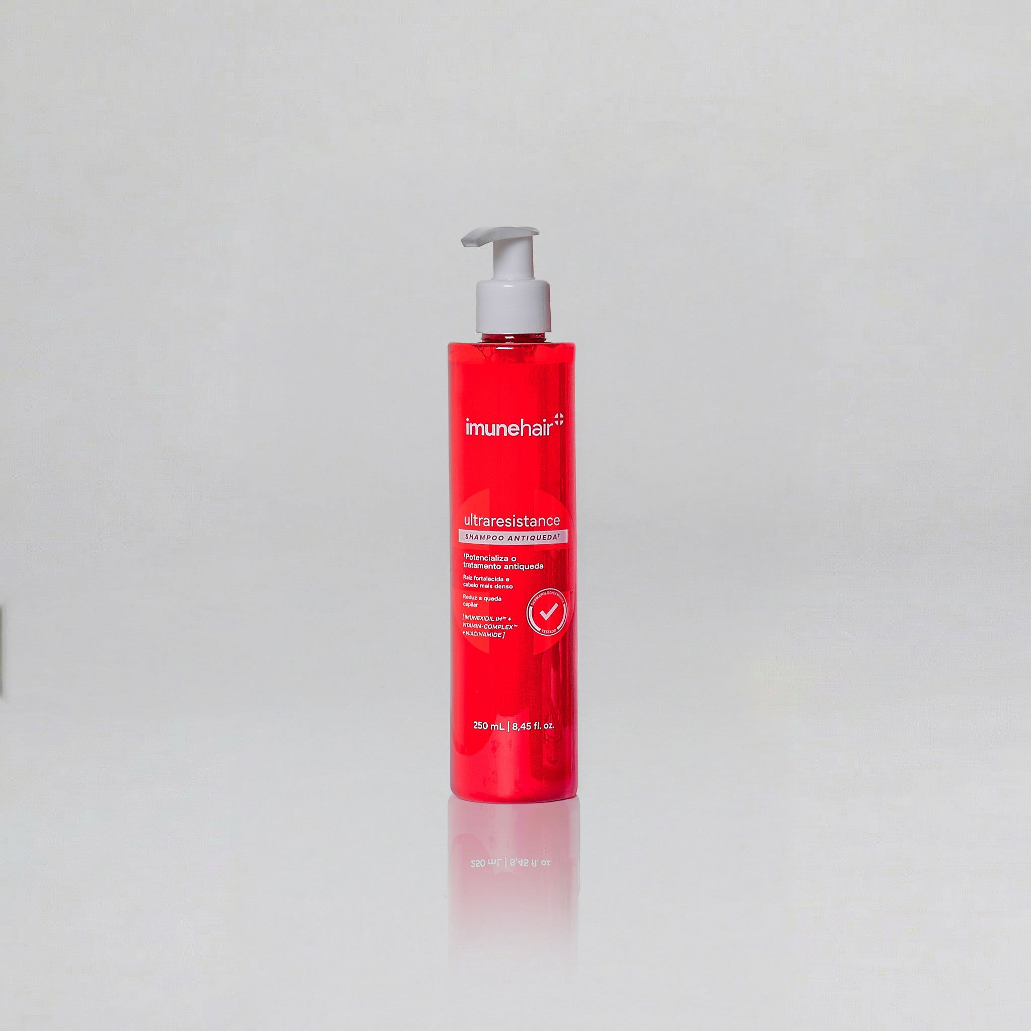 Embalagem vermelha do shampoo antiqueda, com o nome Ultraresistance Shampoo Antiqueda de 250ml.